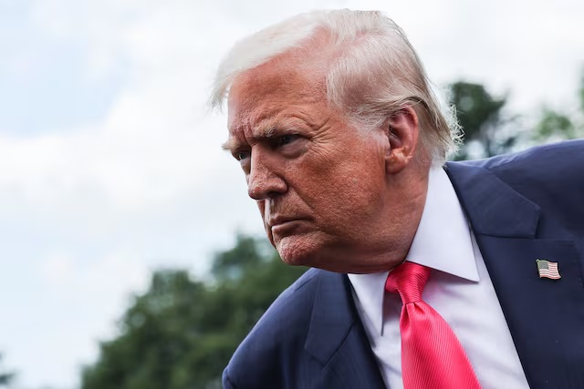 U.S. President Donald Trump speaks with reporters, as he departs for travel to Pennsylvania from the South Lawn at the White House in Washington, D.C. U.S., July 15, 2025. REUTERS/Jonathan Ernst 