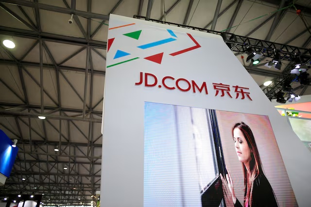 A sign of China's e-commerce company JD.com is seen at CES (Consumer Electronics Show) Asia 2016 in Shanghai, China, May 12, 2016. REUTERS/Aly Song/File Photo