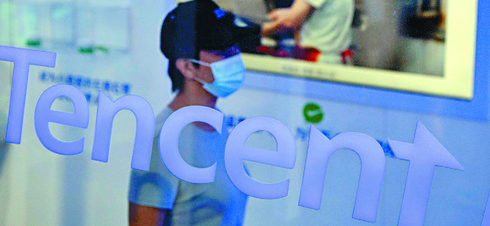 Tech giant Tencent ended the day 3.49 percent lower. AFP Tech giant Tencent ended the day 3.49 percent lower. AFP