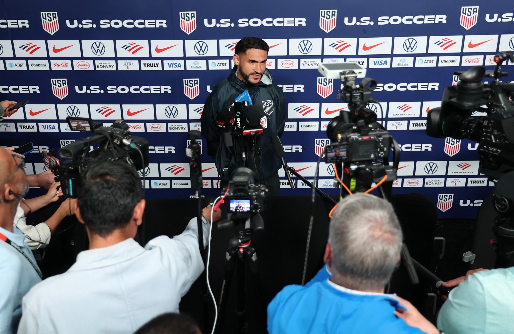 Cristian Roldan #15 of the United States talks to the media during a training session ahead of the 2026 World Cup at the Great Park Sports Complex on June 09, 2026 in Irvine, California. Jamie Squire/Getty Images/AFP