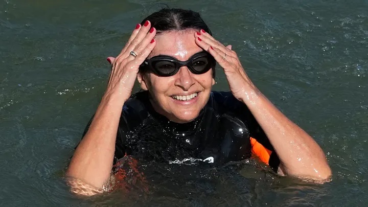 Paris Mayor Anne Hidalgo swims in the Seine River on July 17, 2024, in Paris. (AP Photo/Michel Euler) Paris Mayor Anne Hidalgo swims in the Seine River on July 17, 2024, in Paris. (AP Photo/Michel Euler)