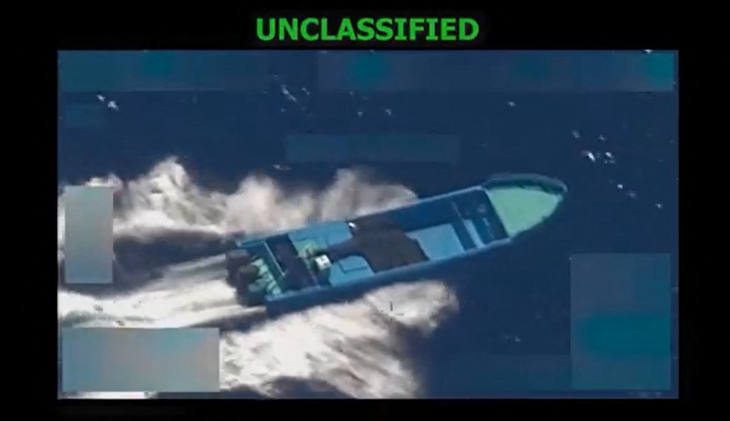 Photo by HANDOUT / US SECRETARY OF DEFENSE PETE HEGSETH'S X ACCOUNT / AFP  This screen grab from a video posted by US Defense Secretary Pete Hegseth on his X account on October 22, 2025, shows what Hegseth says is US military forces conducting a strike on a vessel being operated by a "designated terrorist organization conducting narco-trafficking" in the Eastern Pacific Ocean on October 21, 2025.