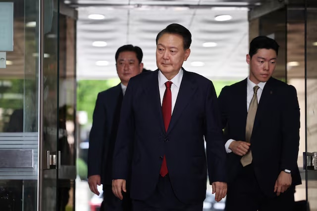 Former South Korean President Yoon Suk Yeol arrives at a court to attend a hearing to review his arrest warrant requested by special prosecutors in Seoul, South Korea, July 9, 2025. REUTERS/Kim Hong-Ji/Pool