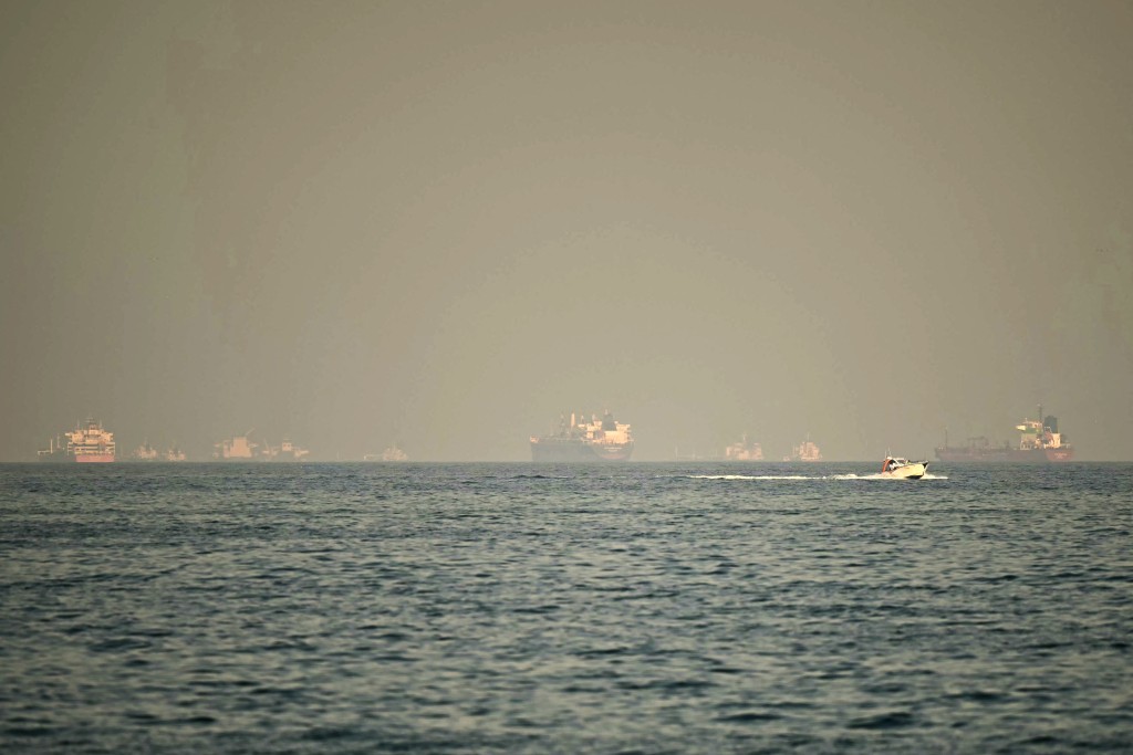 Cargo ships and tankers are seen off coast city of Fujairah, in the Strait of Hormuz in the northern Emirate. (AFP/File)