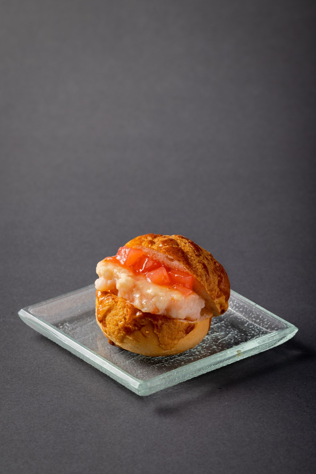 Mini Peach Shrimp Pineapple Bun Burger (Maxim’s Cakes, festival exclusive) - shrimp paste and lightly sweet peach sauce meet inside a soft mini pineapple bun, creating a lively sweet-savory contrast.