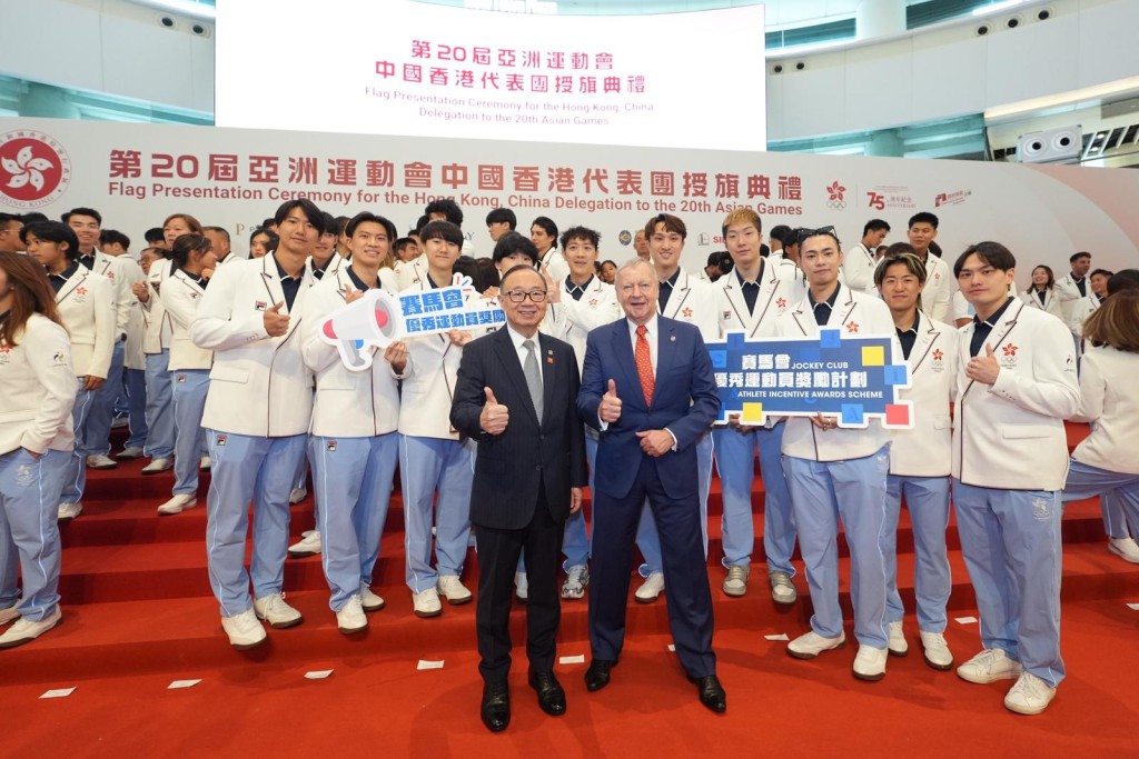 Hong Kong Jockey Club chairman Martin Liao Cheung-kong (front left) and CEO Winfried Engelbrecht-Bresges (front right) pose for a photo with athletes.