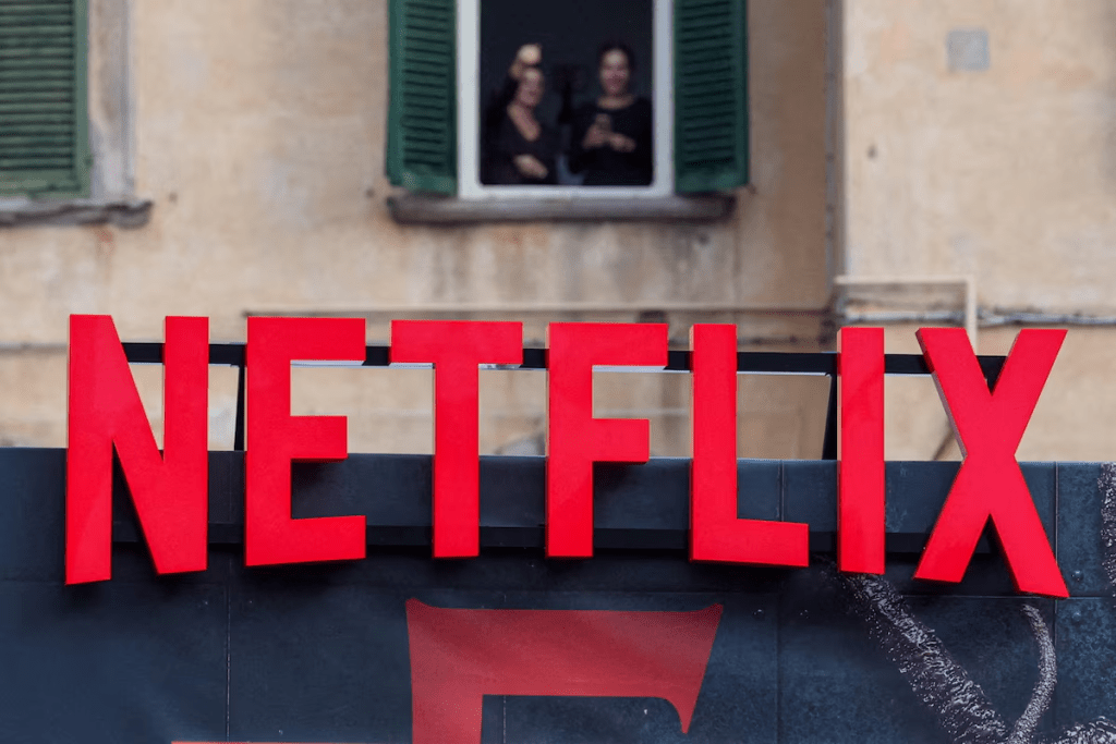 A Netflix logo is displayed at the Lucca Comics & Games 2025 event in Lucca, Italy, October 31, 2025. REUTERS/Claudia Greco/File Photo