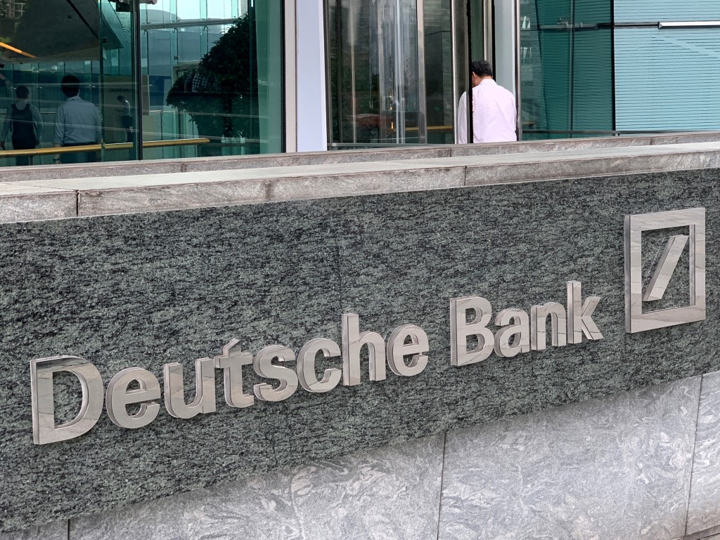 The logo of Deutsche bank is seen in Hong Kong, China July 8, 2019. REUTERS/Tyrone Siu/File Photo