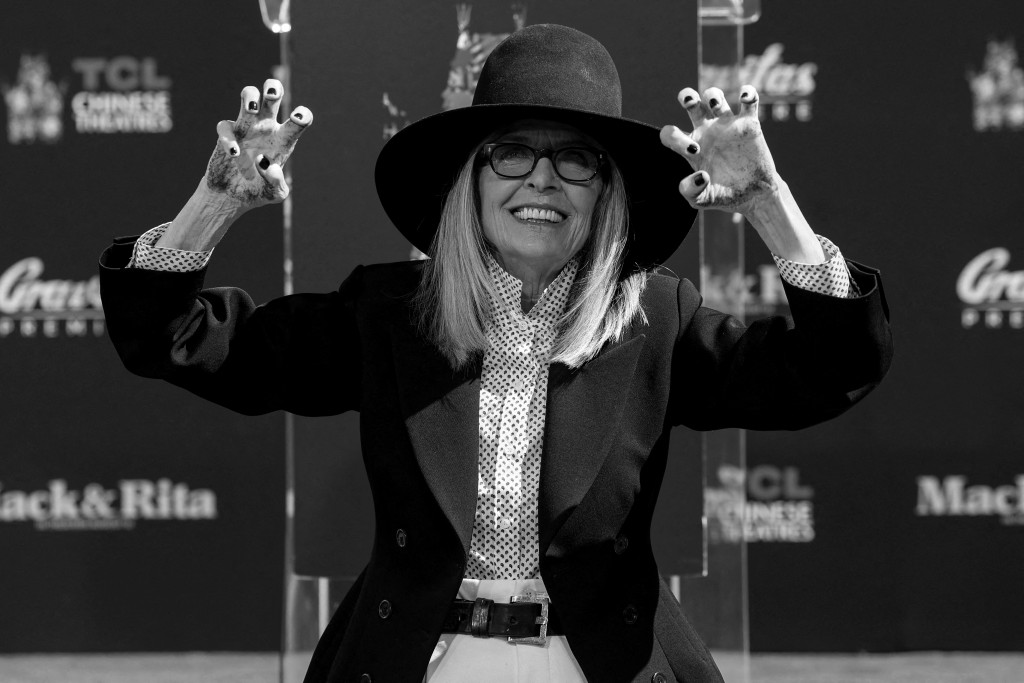 Actor Diane Keaton shows her hands after placing them on fresh cement during a ceremony TCL Chinese theatre in Los Angeles, California, U.S., August 11, 2022. (Reuters)