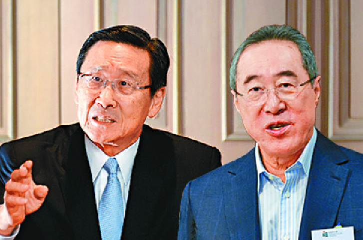 Peter Woo and Henry Tang. Peter Woo and Henry Tang.