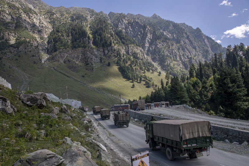 An Indian army convoy moves on the Srinagar- Ladakh highway at Gagangeer, northeast of Srinagar. An Indian army convoy moves on the Srinagar- Ladakh highway at Gagangeer, northeast of Srinagar.
