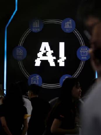 Visitors stand near a sign of artificial intelligence at an AI robot booth at Security China, an exhibition on public safety and security, in Beijing, China June 7, 2023. REUTERS/Florence Lo