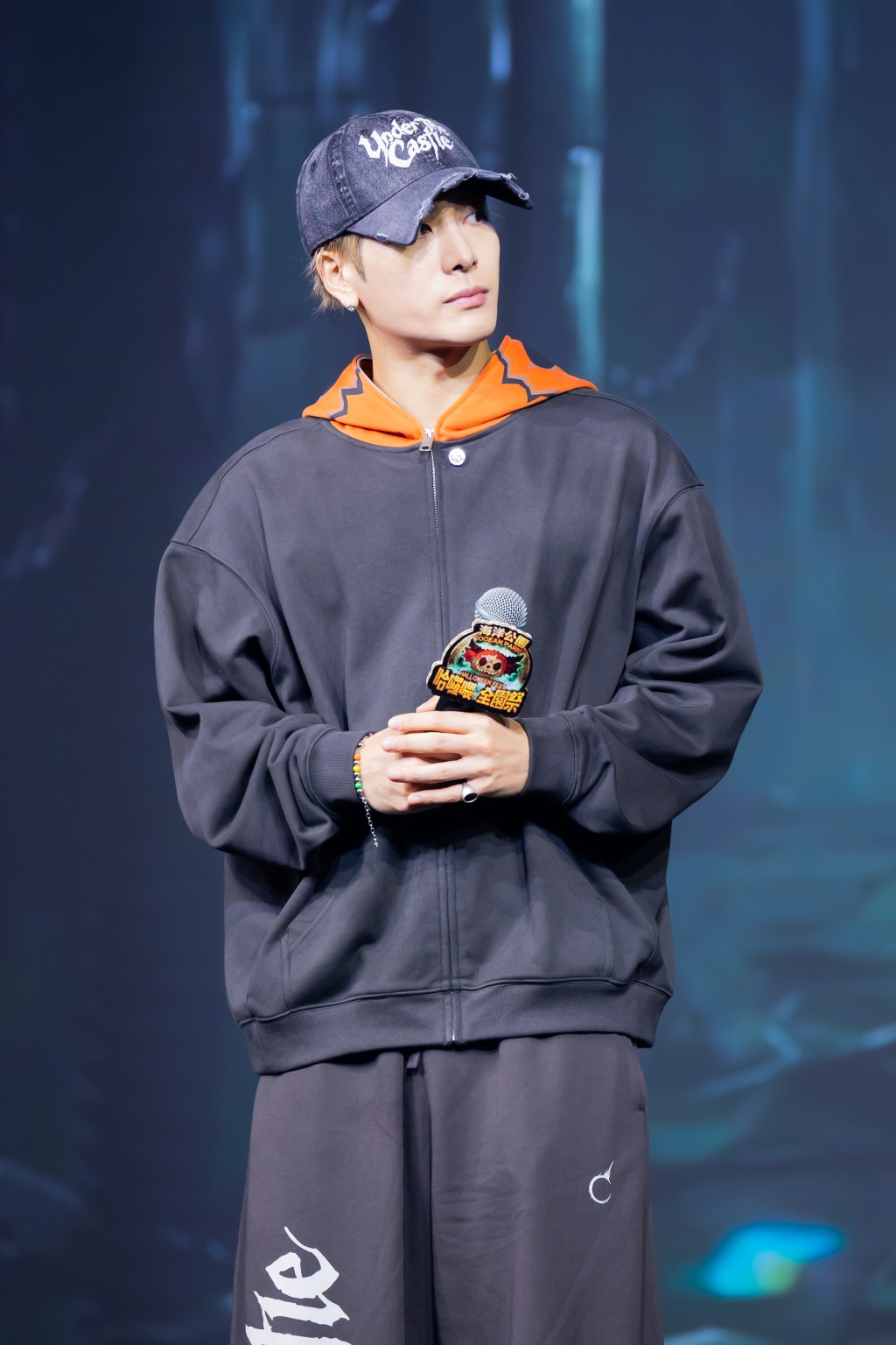 Jackson Wang appears slightly tired during his Ocean Park appearance.