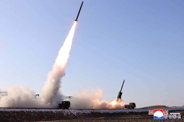 A test of a large-caliber multiple-rocket launch system, directed by North Korean leader Kim Jong Un, is held in an unknown location, North Korea, January 27, 2026, in this picture released by North Korea's official Korean Central News Agency on January 28, 2026. KCNA via REUTERS/File Photo 