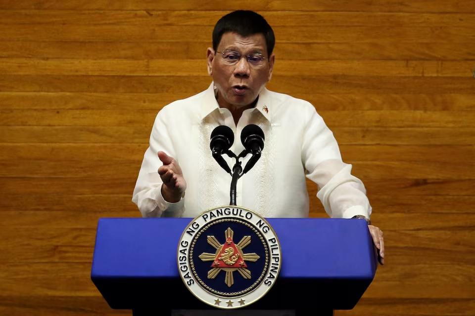 Philippine President Rodrigo Duterte gestures as he delivers his 6th State of the Nation Address (SONA), at the House of Representative in Quezon City, Metro Manila, Philippines, July 26, 2021. REUTERS/Lisa Marie David/File Photo Philippine President Rodrigo Duterte gestures as he delivers his 6th State of the Nation Address (SONA), at the House of Representative in Quezon City, Metro Manila, Philippines, July 26, 2021. REUTERS/Lisa Marie David/File Photo