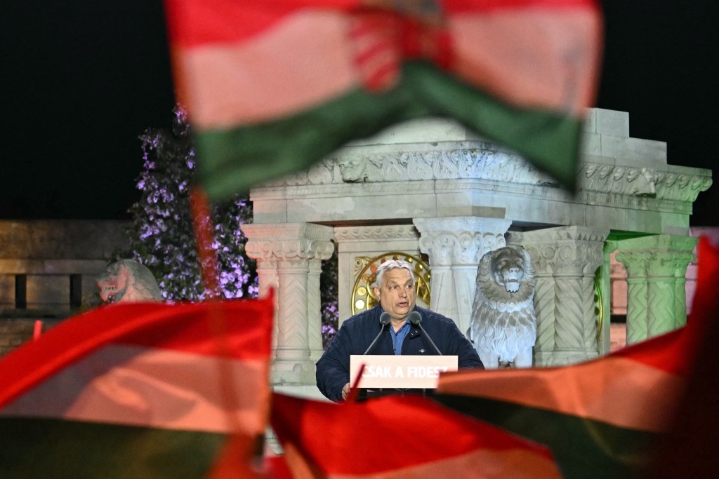 Hungarian Prime Minister Viktor Orban addresses supporters during his campaign closing rally at Buda Castle in Budapest on April 11, 2026, on the eve of the general election in Hungary. (AFP)