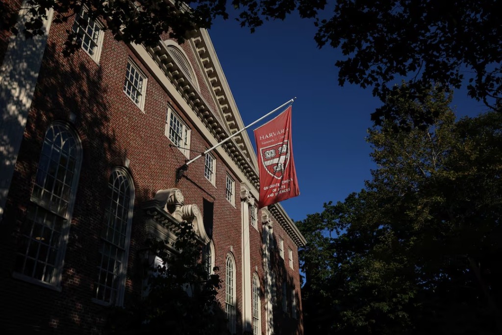 A flag hangs on campus at Harvard University in Cambridge, Massachusetts, U.S., September 4, 2025. REUTERS/Shannon Stapleton