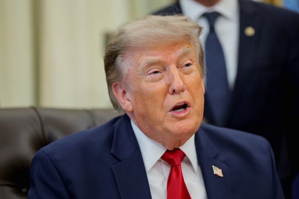  U.S. President Donald Trump speaks during an event to sign an executive order related to Utah protected lands, in the Oval Office at the White House in Washington, D.C., U.S., July 13, 2026. REUTERS/Kylie Cooper