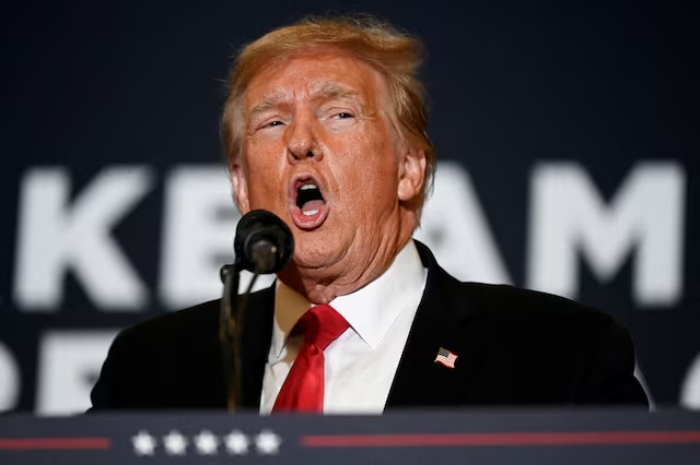 Former U.S. President and Republican presidential candidate Donald Trump speaks during a 'Commit to Caucus' event for his supporters in Coralville, Iowa, U.S., December 13, 2023. REUTERS/Vincent Alban/File Photo Former U.S. President and Republican presidential candidate Donald Trump speaks during a 'Commit to Caucus' event for his supporters in Coralville, Iowa, U.S., December 13, 2023. REUTERS/Vincent Alban/File Photo