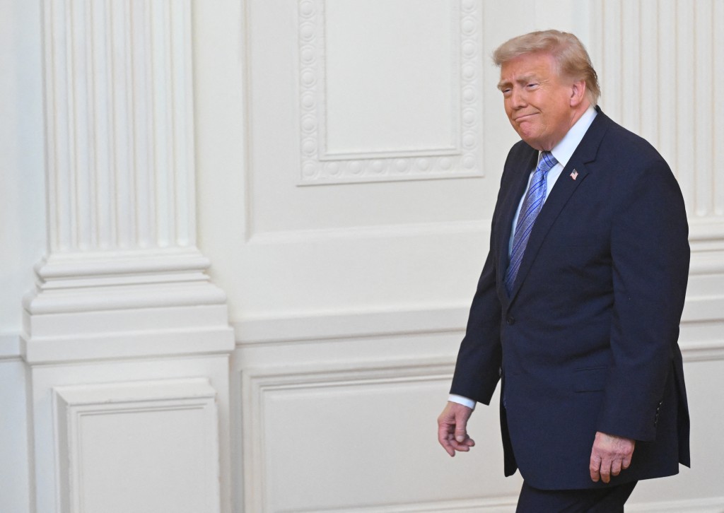  US President Donald Trump arrives to address the nation from the East Room of the White House in Washington, DC on July 16, 2026. (Photo by SAUL LOEB / POOL / AFP)