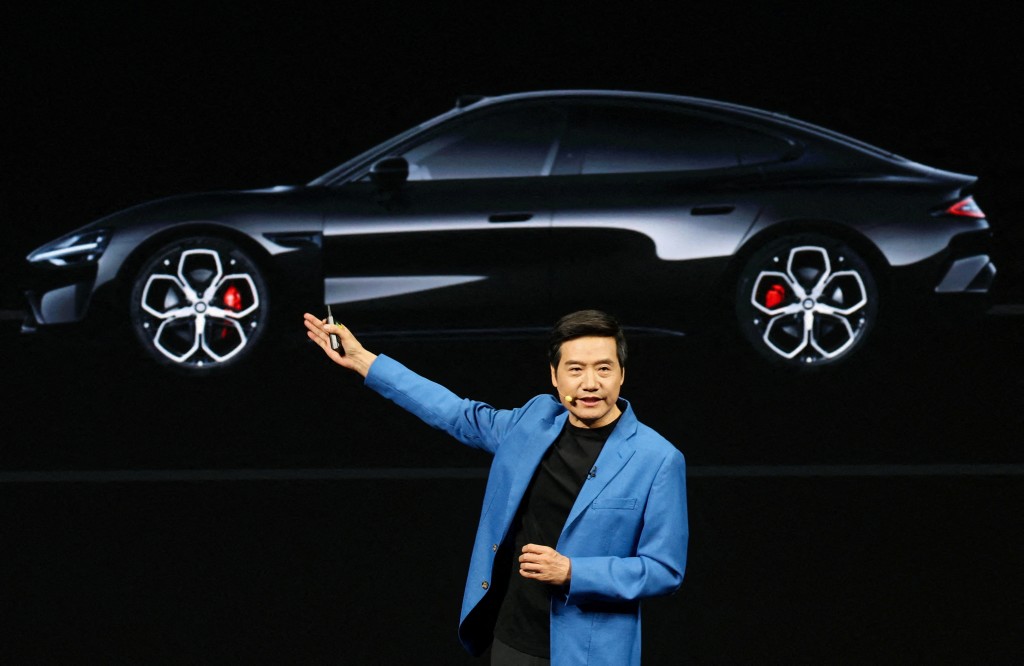 Xiaomi founder and CEO Lei Jun presents the new generation of SU7 electric sedan at the Chinese tech giant launch event in Beijing, China, March 19, 2026. REUTERS
