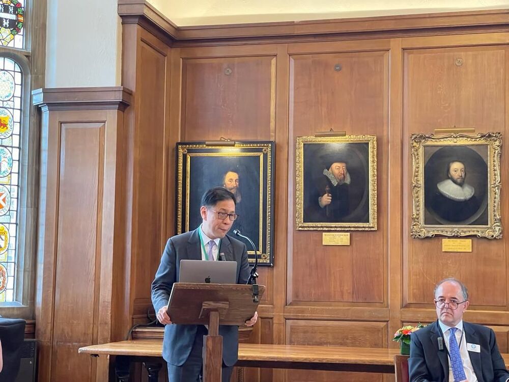 Victor Dawes speaking at the symposium held in London Victor Dawes speaking at the symposium held in London