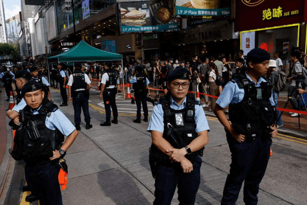 Police stand by in downtown on the 34th anniversary of the 1989 Beijing's Tiananmen Square crackdown, near where the candlelight vigil is usually held, in Hong Kong, China June 4, 2023. (REUTERS/Tyrone Siu) Police stand by in downtown on the 34th anniversary of the 1989 Beijing's Tiananmen Square crackdown, near where the candlelight vigil is usually held, in Hong Kong, China June 4, 2023. (REUTERS/Tyrone Siu)