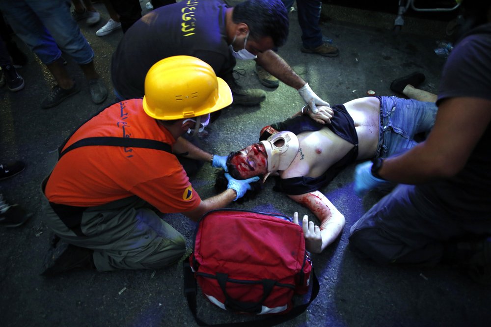 A injuried protestor lies on the floor during clashes with police as part of a protest against the political elites and the government after this week's deadly explosion at Beirut port which devastated large parts of the capital in Beirut, Lebanon. A injuried protestor lies on the floor during clashes with police as part of a protest against the political elites and the government after this week's deadly explosion at Beirut port which devastated large parts of the capital in Beirut, Lebanon.