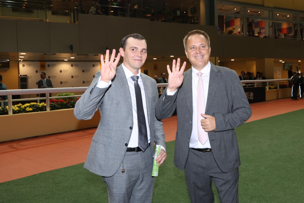 Ronan and Caspar Fownes celebrate a four-timer that put the stable on top of the trainers' championship standings (Sing Tao) 