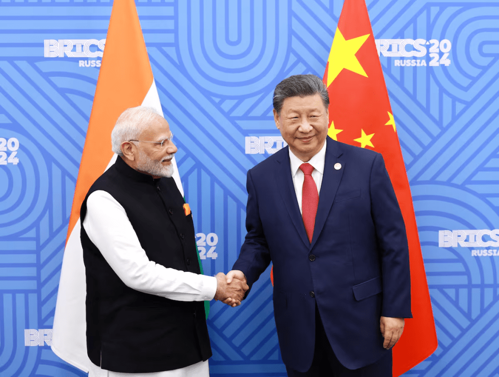 Chinese President Xi Jinping and India Prime Minister Narendra Modi meet on the sidelines of the BRICS summit in Kazan, Russia October 23, 2024. China Daily via REUTERS/File Photo