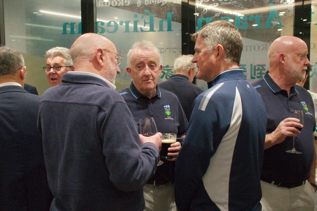 Attendees, including former players, attend a reception for the University College Dublin 1976 football squad at Ireland House in Shanghai on April 24, 2026. (Photo by Agatha Cantrill / AFP)