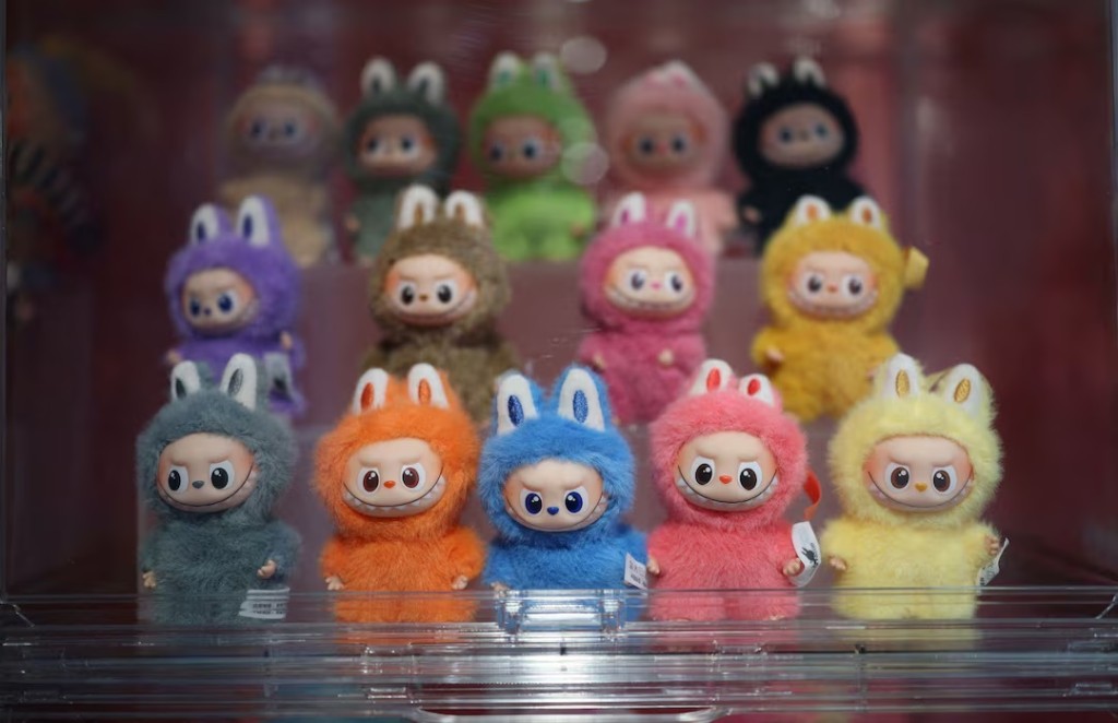 A range of POP MART Labubu The Monsters Big into Energy Series Vinyl Plush toys at an AliExpress pop-up store on Singles' Day in London, Britain, November 11, 2025. REUTERS/Isabel Infantes/File Photo