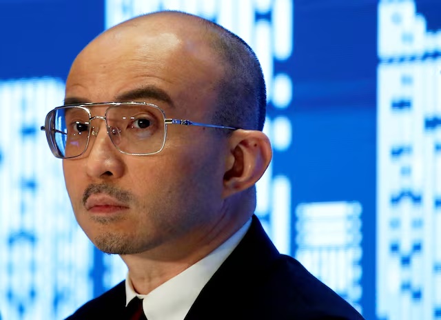 Bao Fan, famed rainmaker and head of China Renaissance Group, holds a news conference to mark the firm's IPO in Hong Kong, China September 13, 2018. REUTERS/Bobby Yip/File Photo 