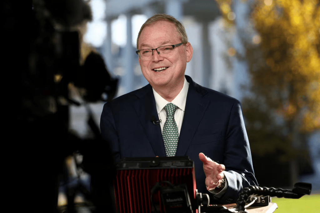U.S. White House economic adviser Kevin Hassett speaks in front of a TV camera at the White House in Washington, D.C., U.S., November 13, 2025. REUTERS/Kevin Lamarque