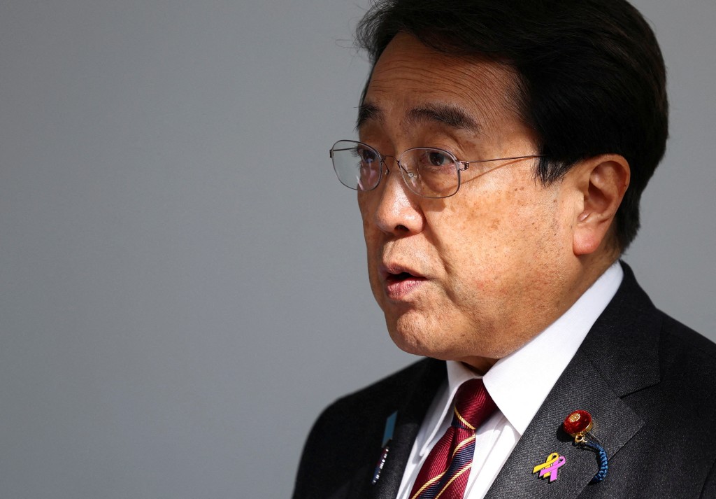  Japan's Economic Revitalization Minister Ryosei Akazawa speaks to the press upon his arrival at Haneda Airport, a day after ministerial talks on tariffs, with U.S. President Donald Trump joining the negotiators, in Tokyo, Japan, April 18, 2025. REUTERS/Issei Kato/File Photo