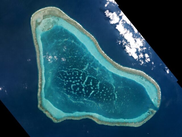 Boats at Scarborough Shoal in the South China Sea. (Reuters/File)
