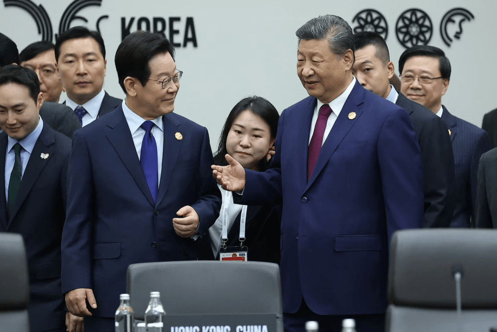 China's President Xi Jinping talks with South Korea's President Lee Jae Myung during the Asia-Pacific Economic Cooperation (APEC) summit in Gyeongju, South Korea, October 31, 2025. Yonhap via REUTERS