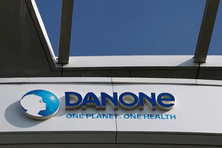 A logo of French food group Danone is seen at the company headquarters in Rueil-Malmaison near Paris, France, April 14, 2025. REUTERS/Stephanie Lecocq/File Photo