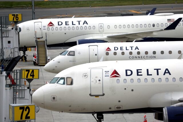 Delta Airlines passenger jets are pictured outside the newly completed 1.3 million-square foot $4 billion Delta Airlines Terminal C at LaGuardia Airport in the Queens borough of New York City, New York, U.S., June 1, 2022. REUTERS/Mike Segar/File Photo 