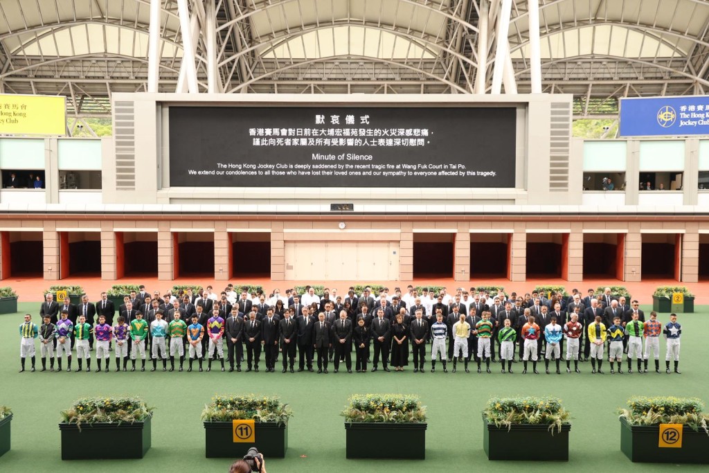 Stewards, officials, trainers, jockeys and staff observe a minute of silence at Sha Tin's 'closed door' race meeting on Saturday. Singtao
