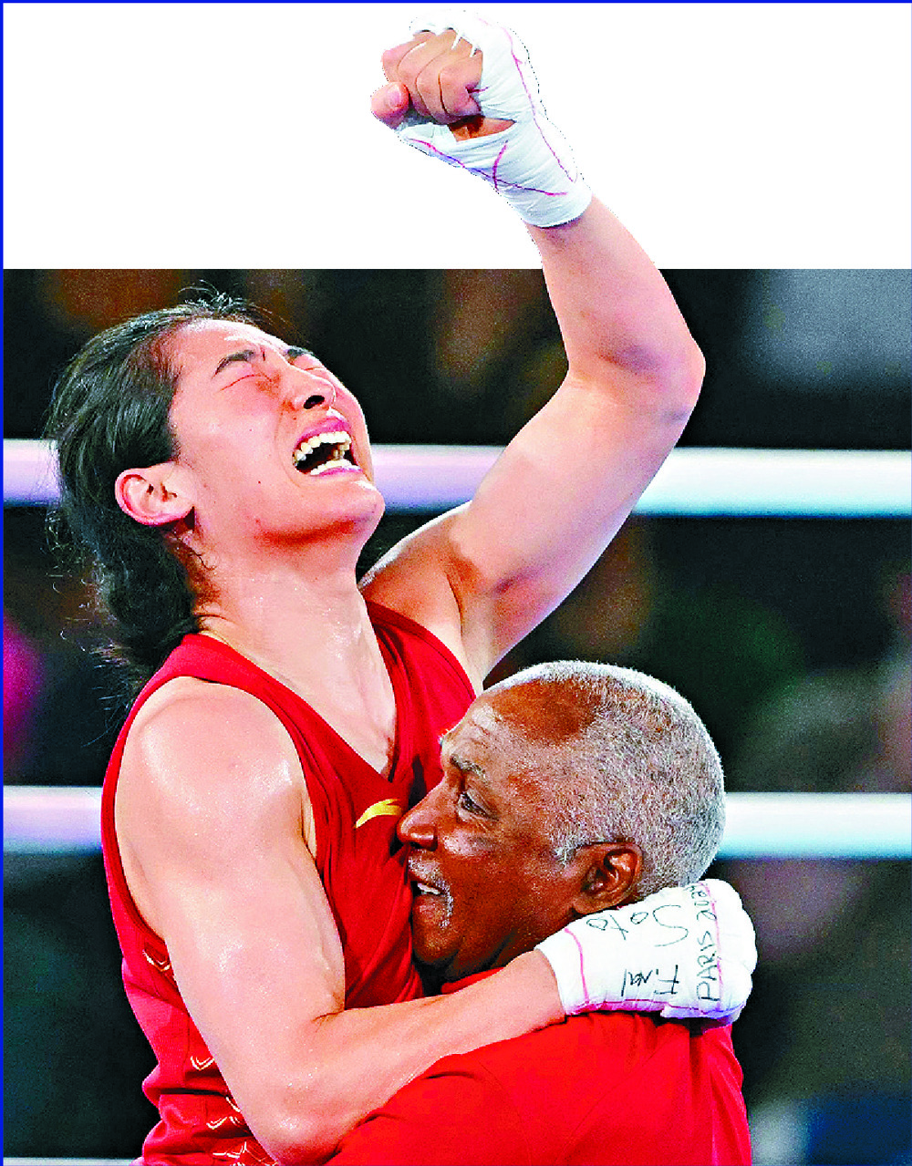 An emotional
Li Qian celebrates her gold-winning victory in women's boxing. AFP An emotional
Li Qian celebrates her gold-winning victory in women's boxing. AFP