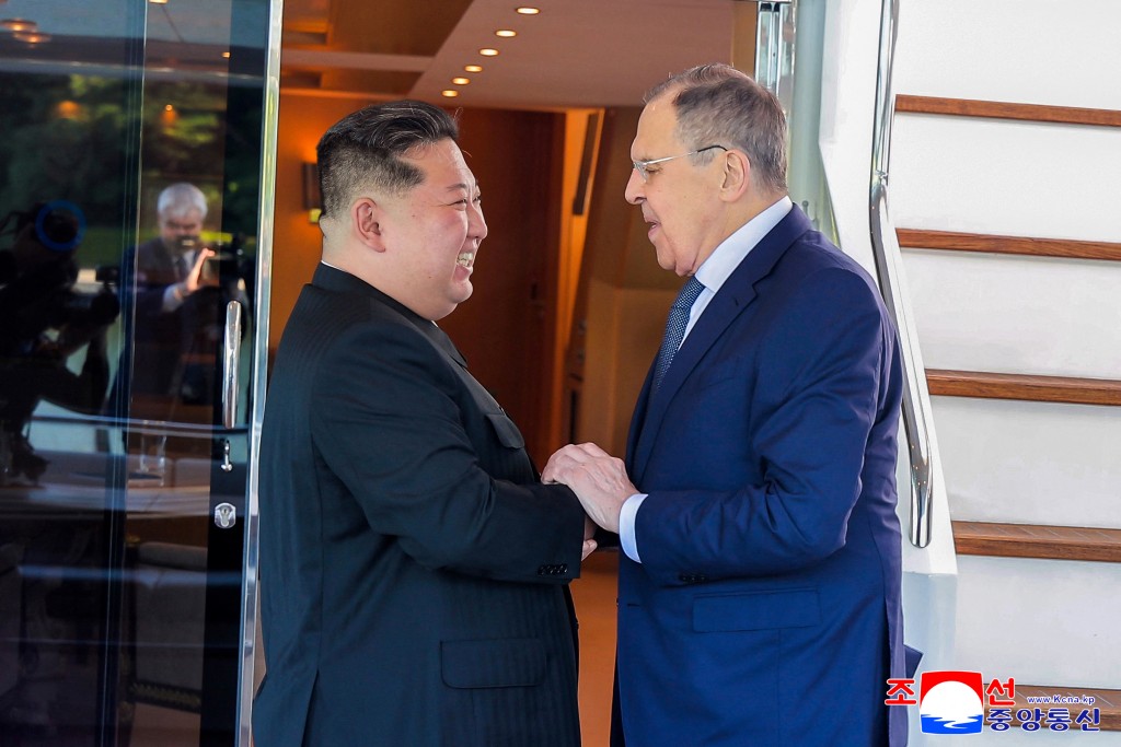North Korean leader Kim Jong Un greets Russian Foreign Minister Sergei Lavrov during a meeting in Wonsan, North Korea July 12, 2025. (Reuters)