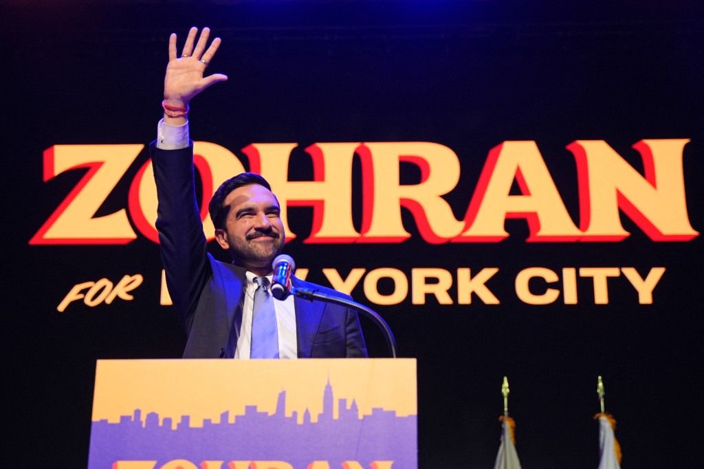 Photo by ANGELINA KATSANIS / AFP New York City Mayoral candidate Zohran Mamdani celebrates during an election night event at the Brooklyn Paramount Theater in Brooklyn, New York on November 4, 2025.
