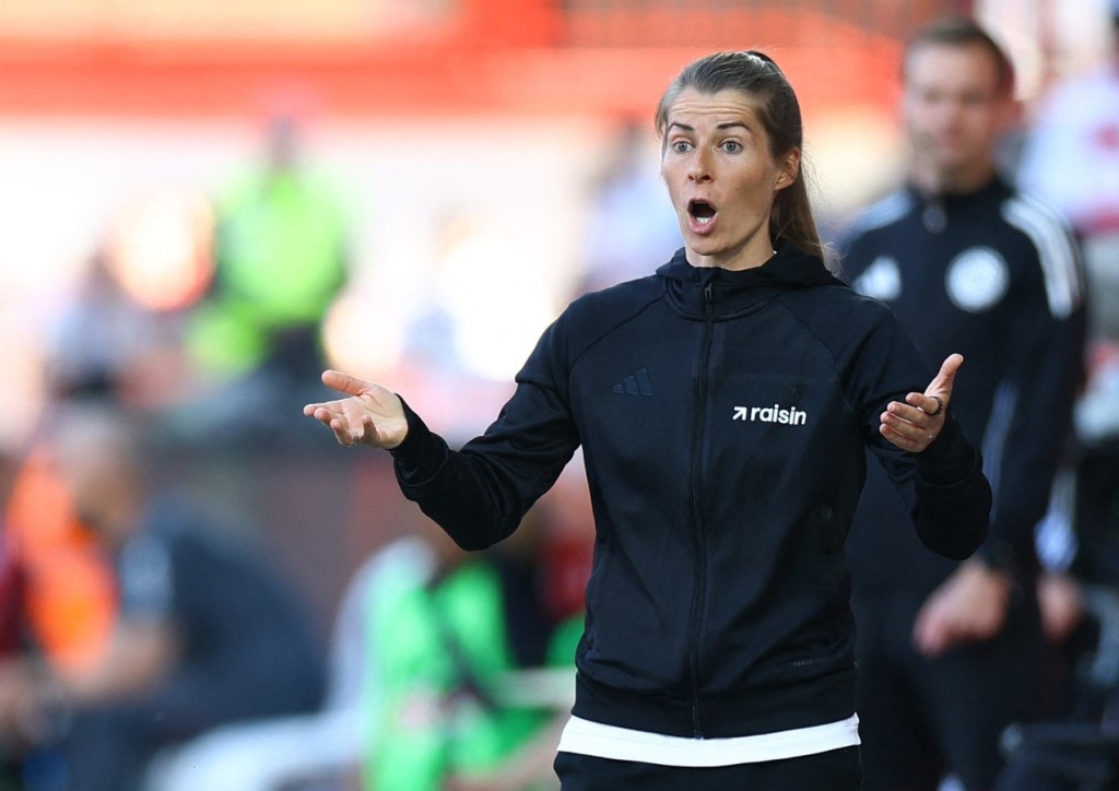 Mary-Louise Eta deflected questions about being the first female coach to win a Bundesliga match. REUTERS