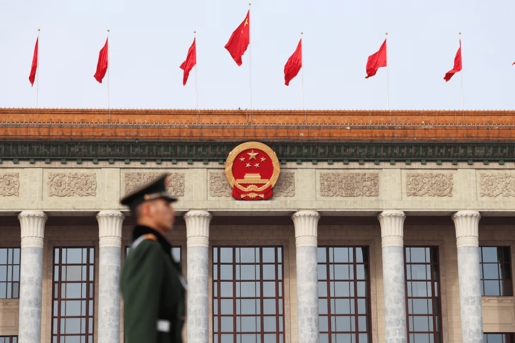 A paramilitary police officer stands guard, on the day of the opening session of the Chinese People's Political Consultative Conference (CPPCC), in front of the Great Hall of the People, in Beijing, China March 4, 2024. REUTERS/Tingshu Wang/File Photo