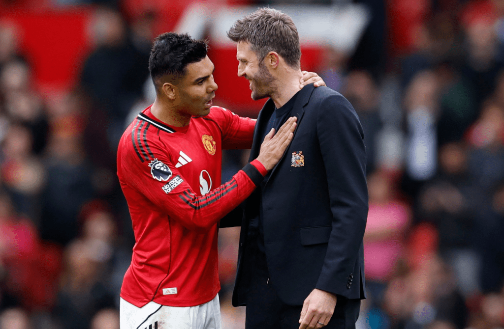 Michael Carrick, with Brazilian Casemiro, successfully guided Manchester United back into the Champions League. REUTERS 