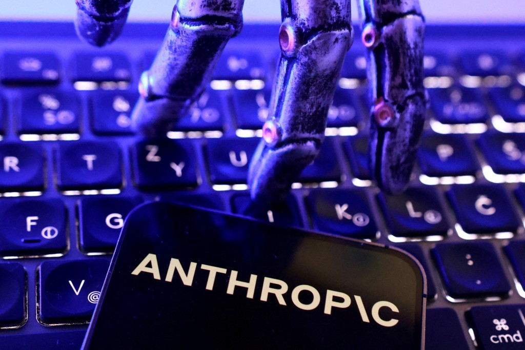 Anthropic logo, a keyboard and a robotic hand in this illustration taken June 5, 2026. REUTERS