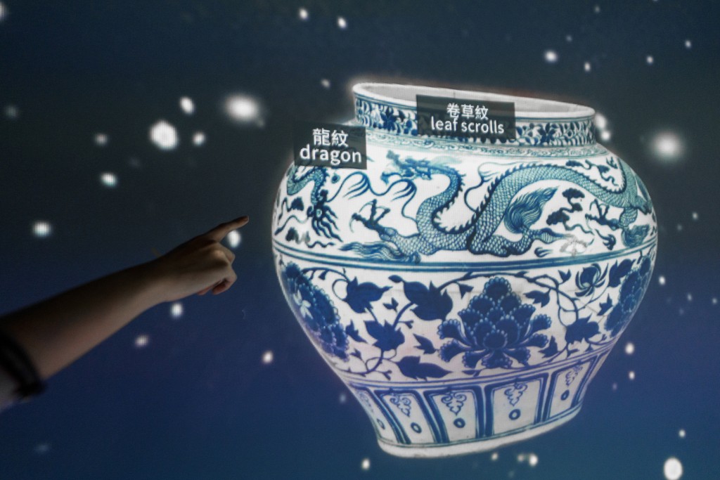Touch the patterns on the wall for hints and explore the wealth of motifs on the artefacts. Photo: Derry Ainsworth © Hong Kong Palace Museum