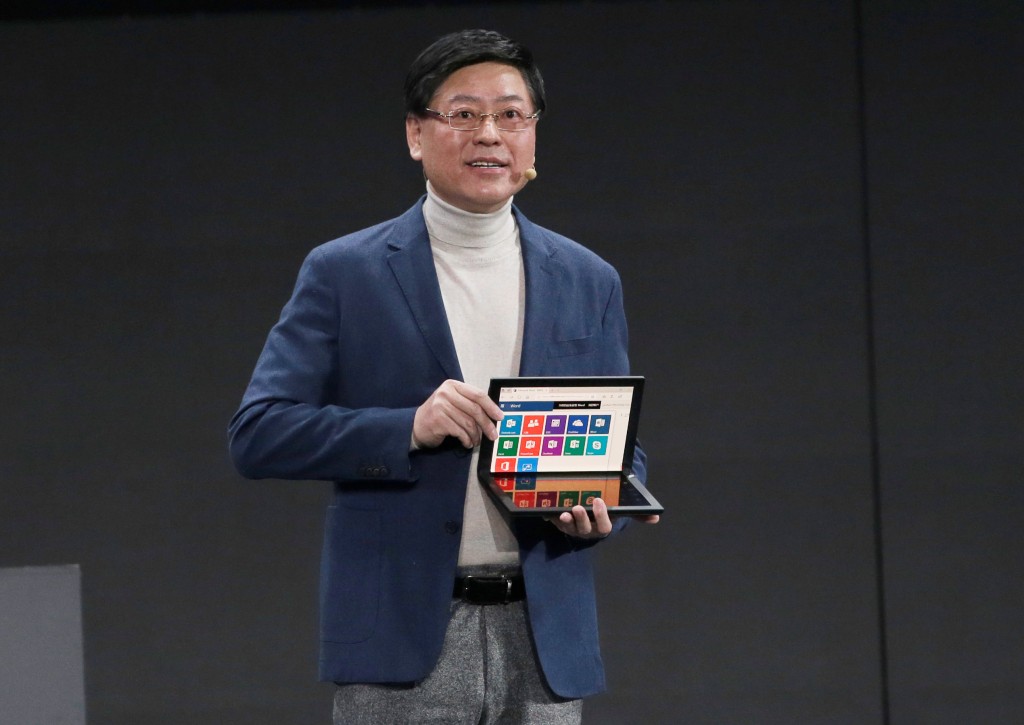 Lenovo Chairman and CEO Yang Yuanqing displays Lenovo's foldable PC Thinkpad X1 at Lenovo Tech World in Beijing, China November 15, 2019. REUTERS/Jason Lee