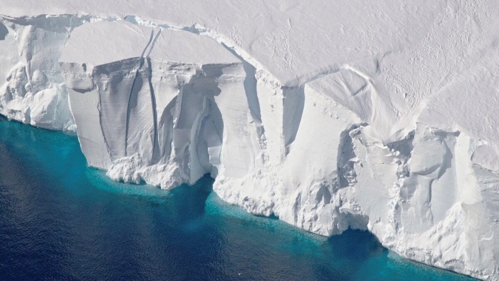 An aerial view of the 200-foot-tall (60-meter-tall) front of the Getz Ice Shelf with cracks, in Antarctica, in this 2016 handout image. NASA/Handout via REUTERS 